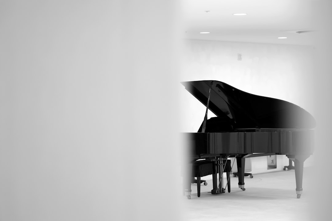 A black and white photo of a piano